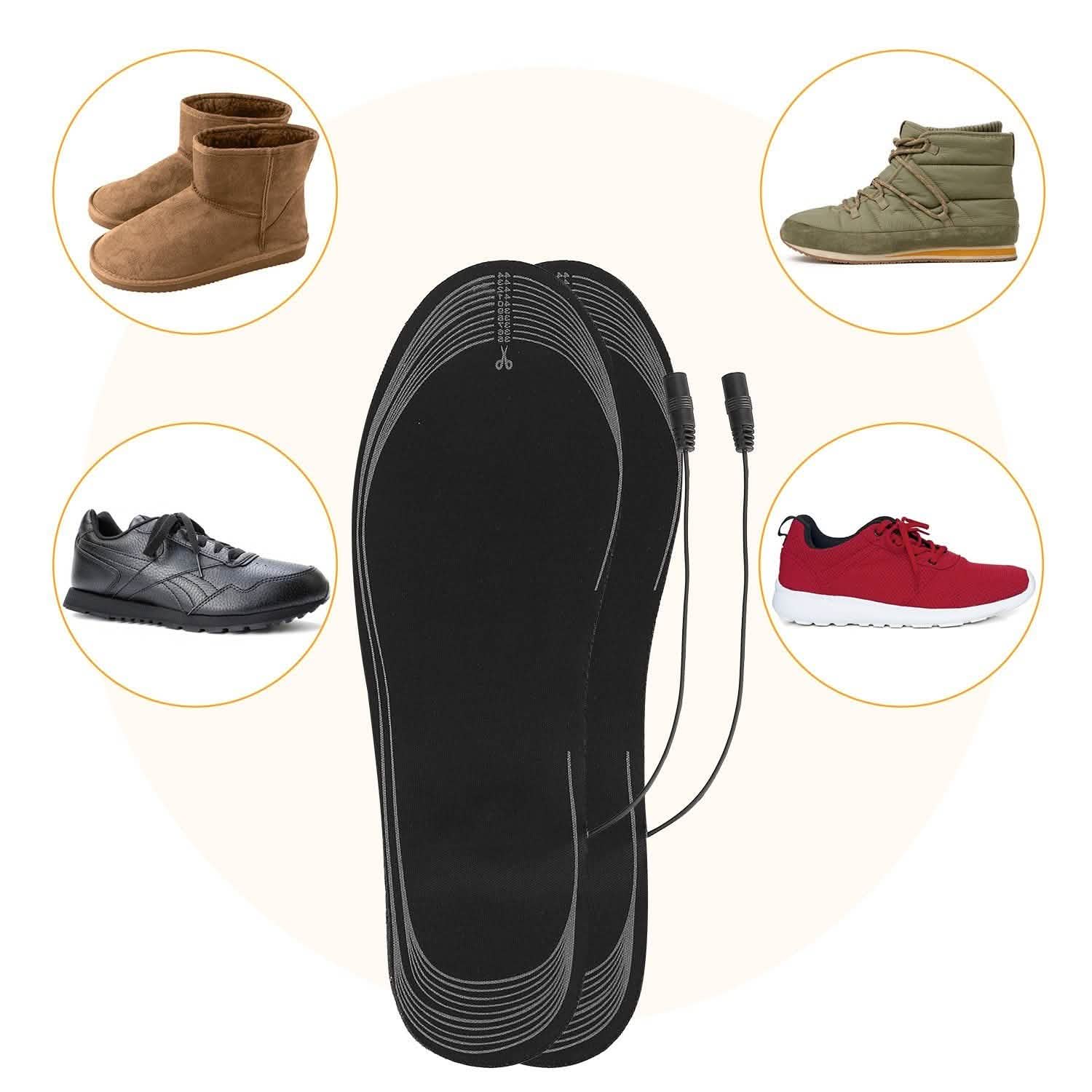 Pair of black USB heated insoles with two cable leads