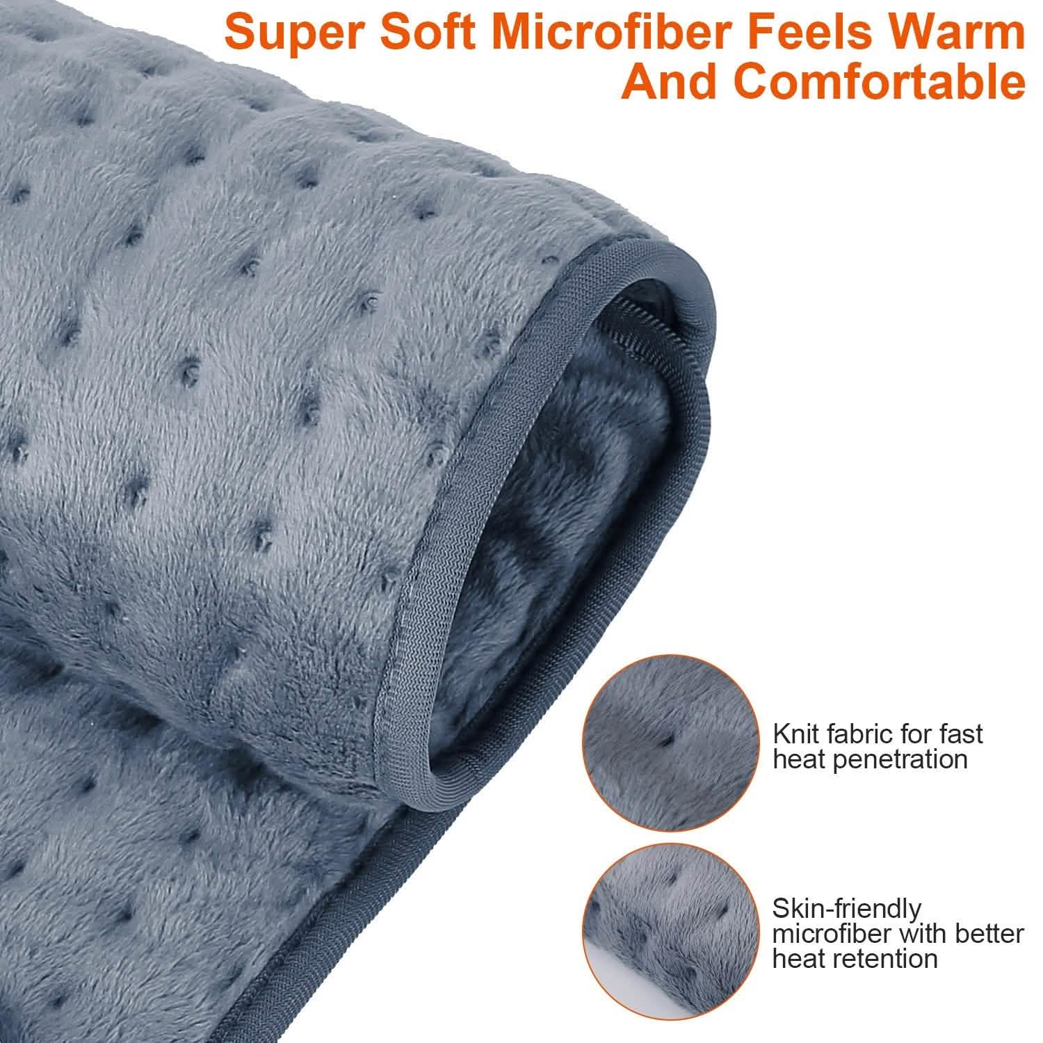 Corner view of dark blue electric heating pad with textured microfleece surface