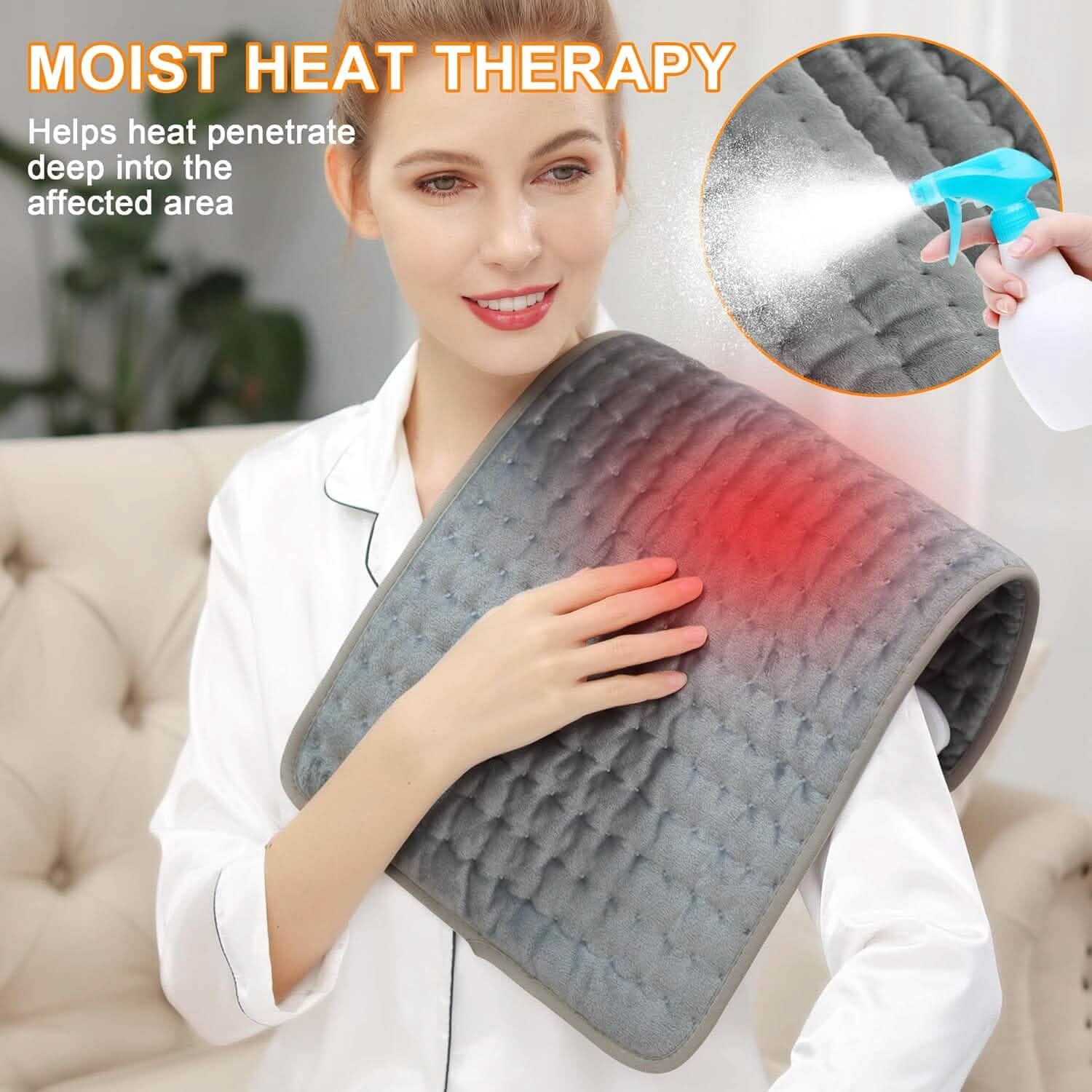 Grey moist-heat electric heating pad with spray water mist near fabric surface