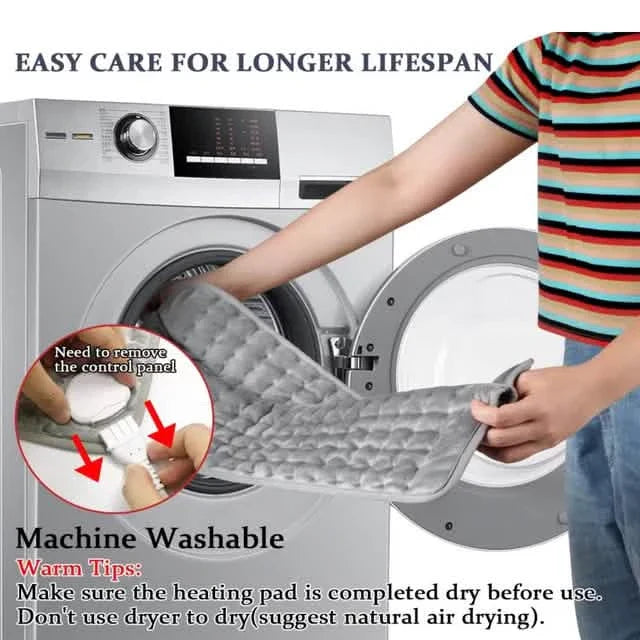 Gray machine-washable heated pad inside a washing machine drum