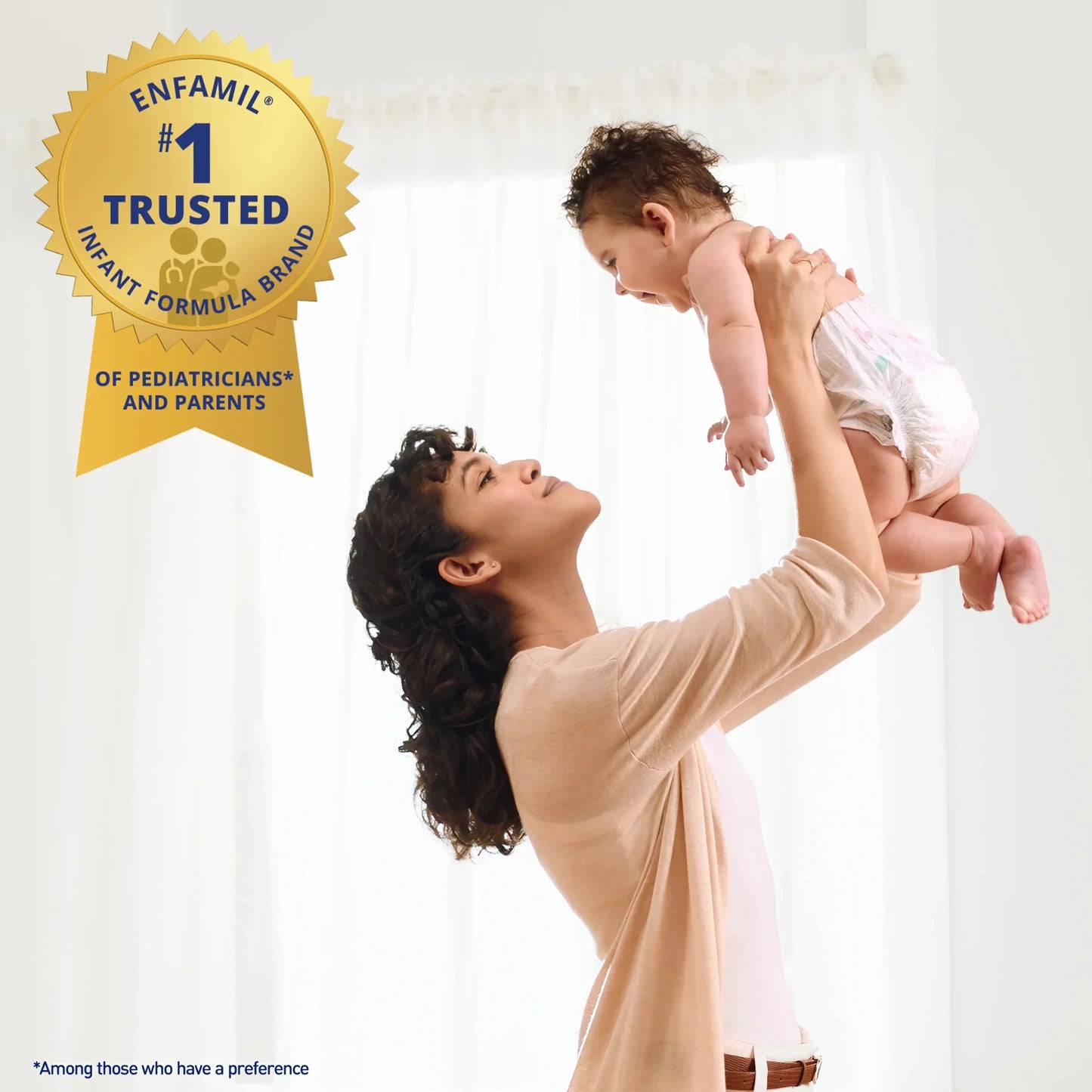Enfamil #1 trusted infant formula brand ad with parent holding baby