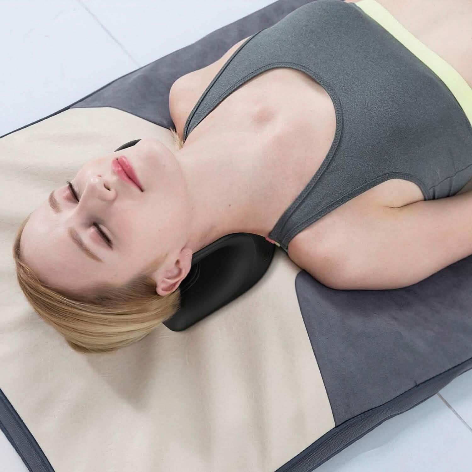 Heated neck traction pillow with U-shaped cutout, dark gray cover