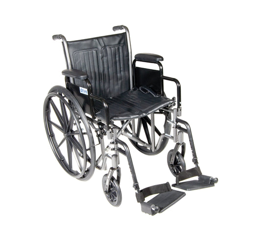 Silver wheelchair with black padded seat, desk arms, swing-away footrests, 18" seat.