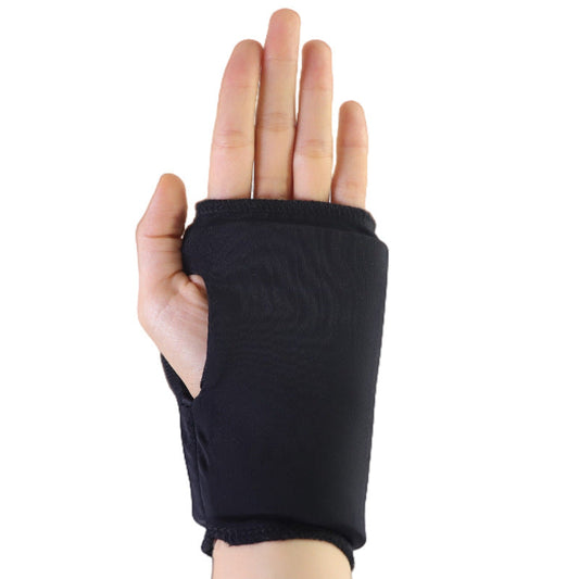 Black wrist wrap brace with open thumb cutout and padded support for hot/cold therapy