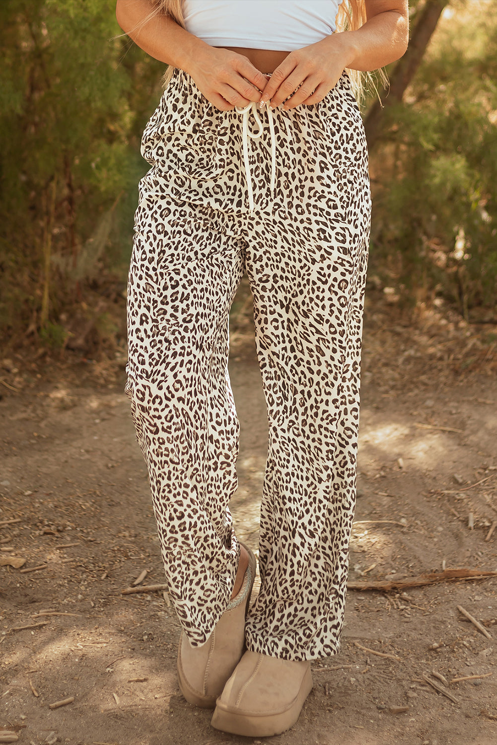 Leopard print loose pants with adjustable drawstring waist, wide legs, brown and cream.