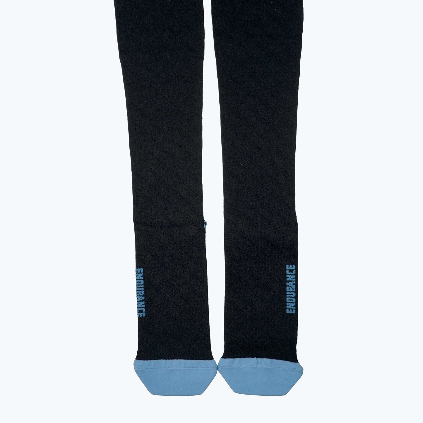 Pair of dark compression socks with blue heel/toe and branding on shin