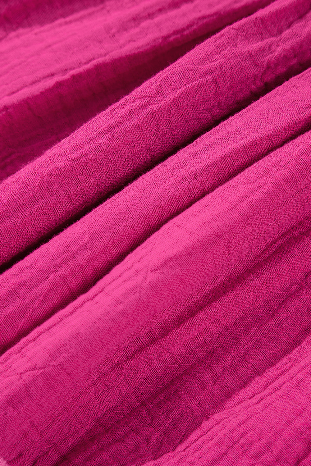 Pink textured fabric for tiered mini dress, visible woven weave