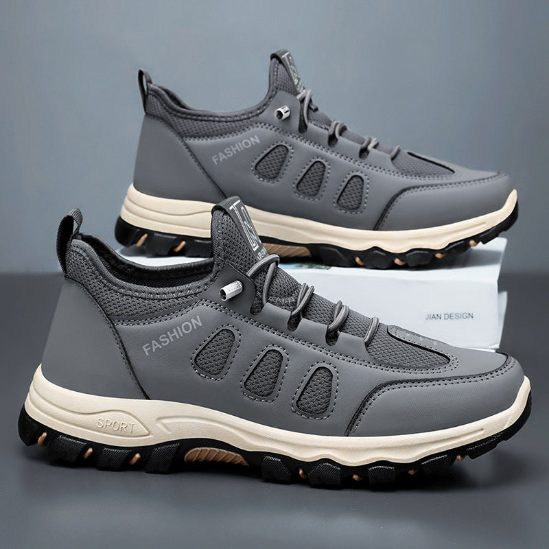 Lightweight travel shoes in gray with lace-up front and cushioned white midsole