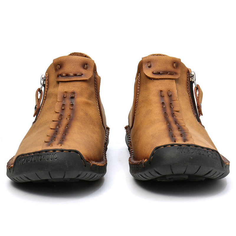 Tan men's ankle boots, front and back view, side zipper and stitched leather upper