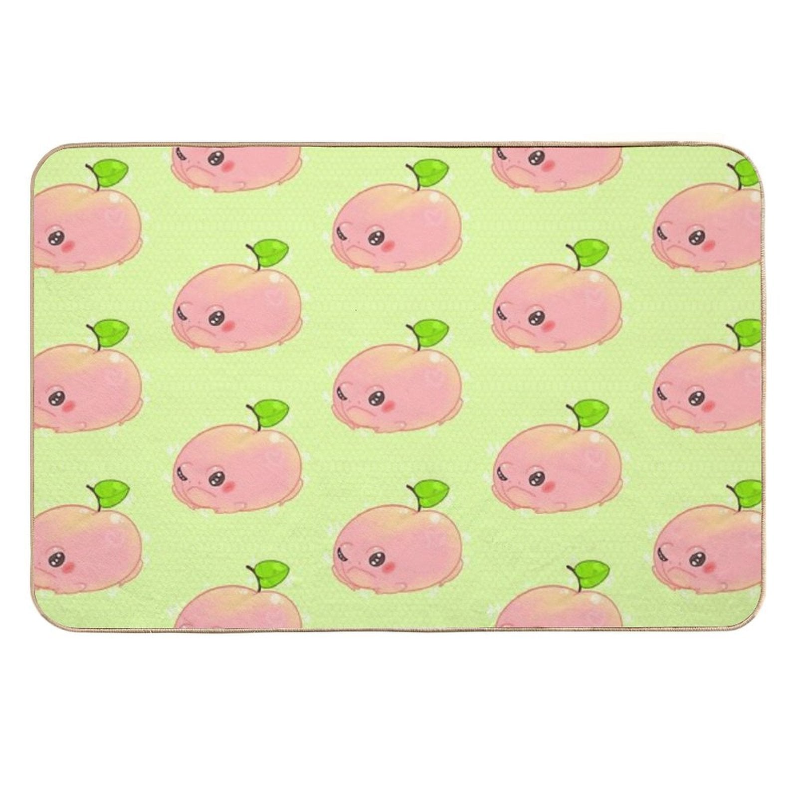 Peach frog bath mat featuring multiple pink frog faces with green leaf details