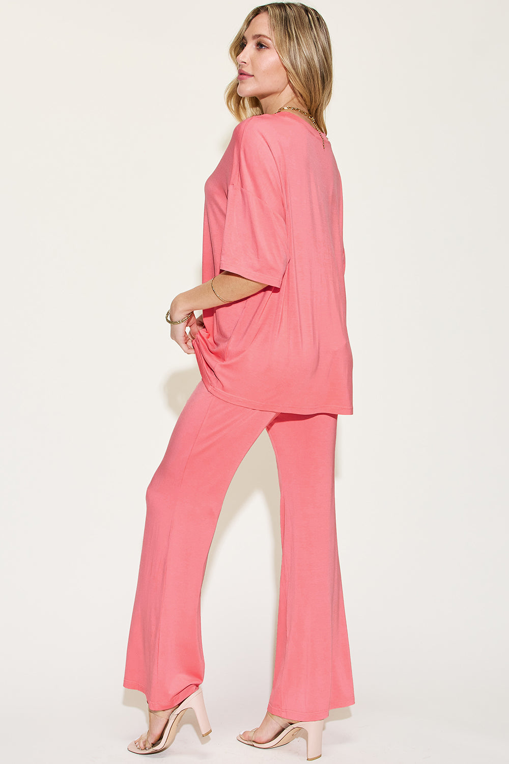 Coral back-view drop-shoulder t-shirt and flare pants set with loose short sleeves