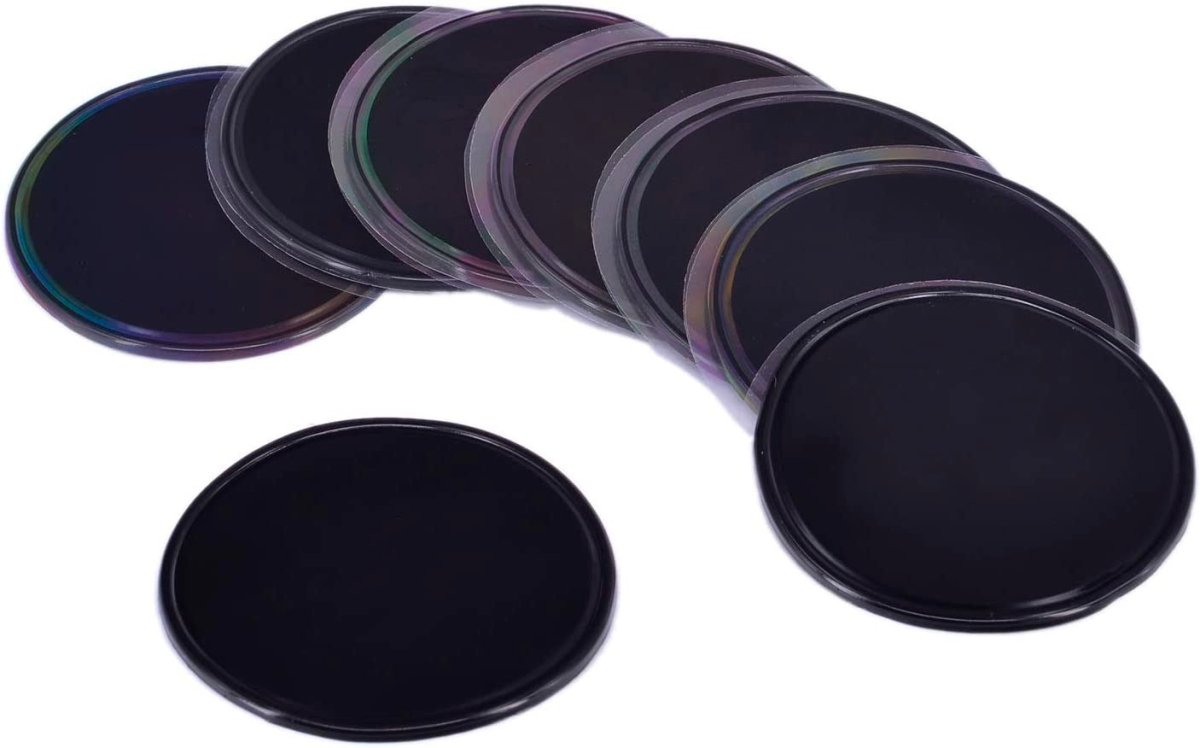 Dark round gel pads (5-pack) for gripping and securing items to surfaces