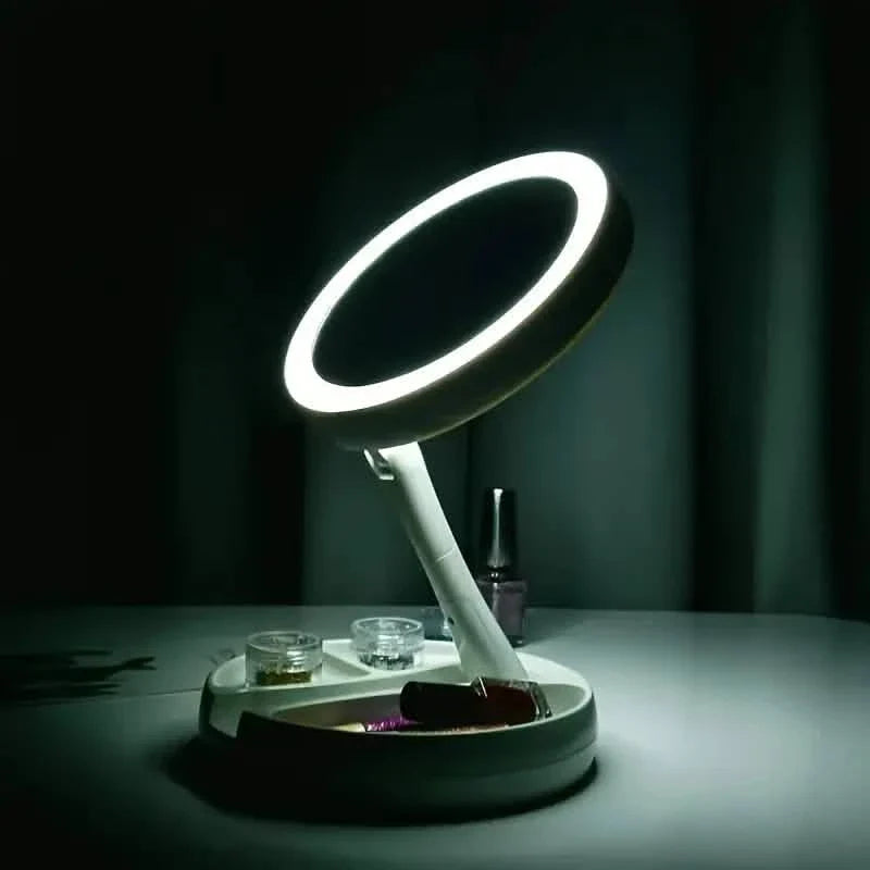 LED vanity mirror with glowing ring light and round base storage tray