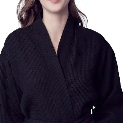 Womens waffle robe, black, V-neck collar and textured knit fabric close-up.