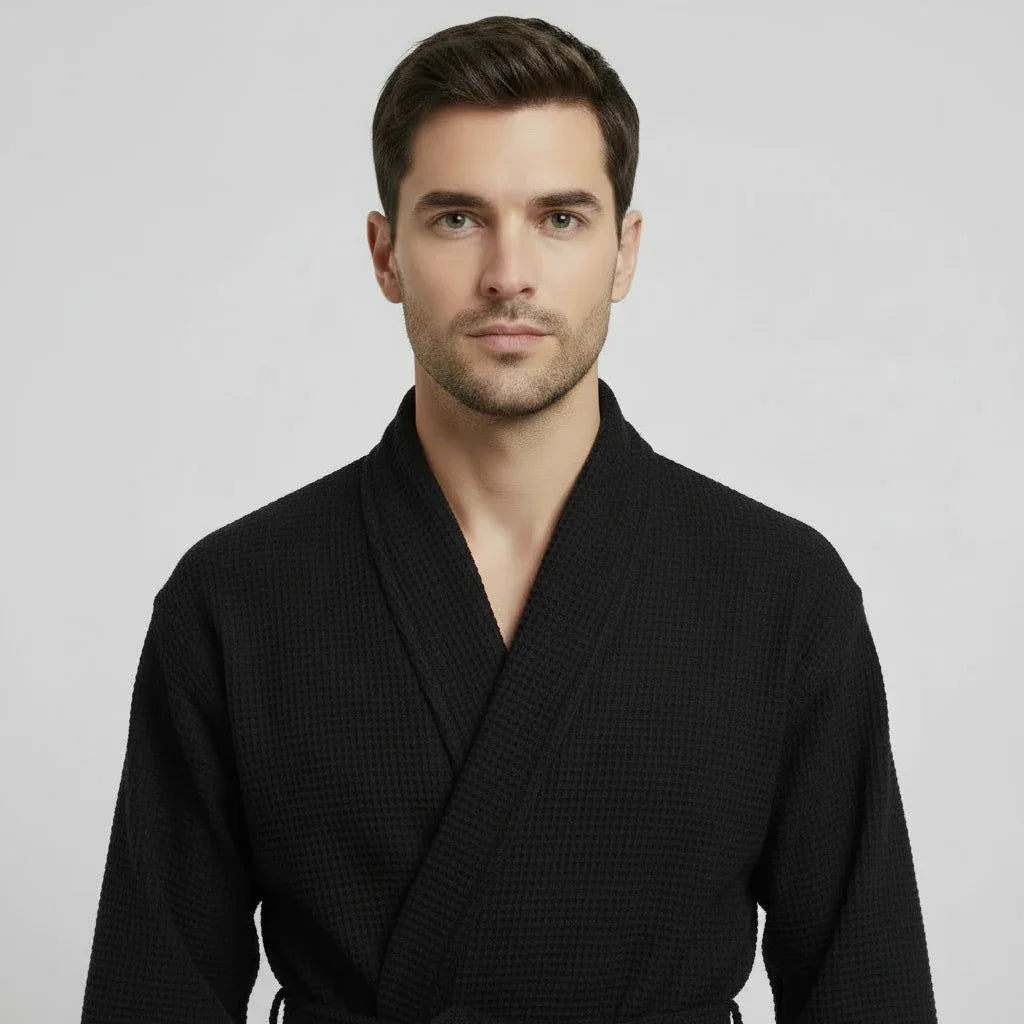 Men's waffle bathrobe in black with shawl collar and belt, front view
