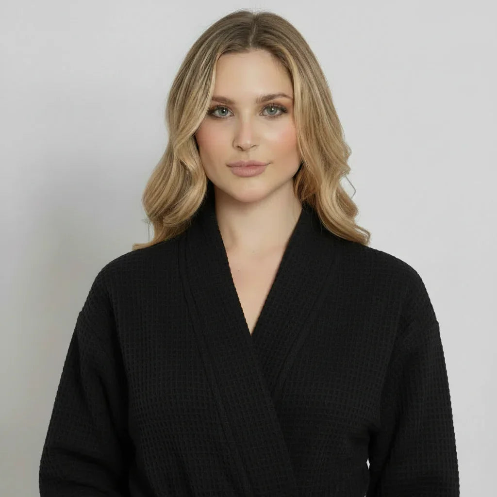 Women’s waffle robe close-up, black V-neck with long sleeves and belt tie