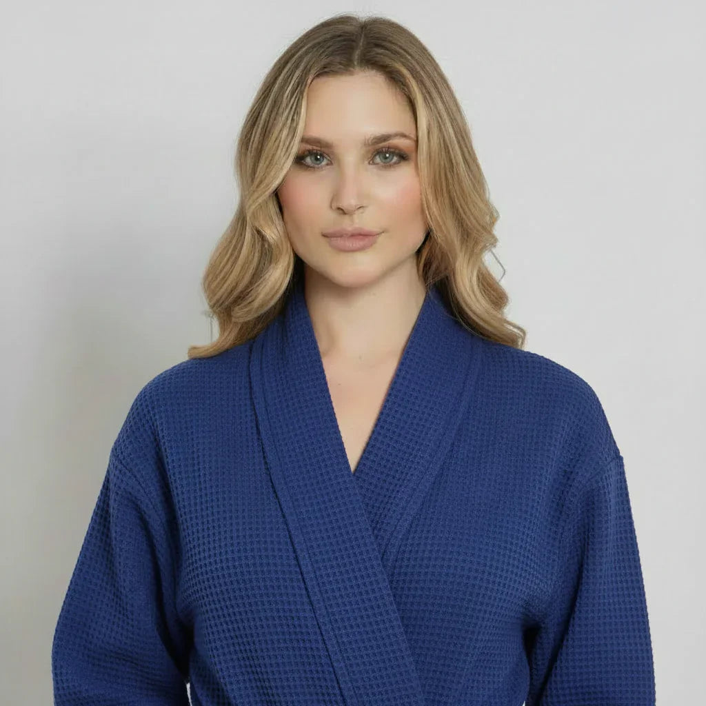 Womens waffle robe, deep blue, V-neck styling, long sleeves, front view close-up.