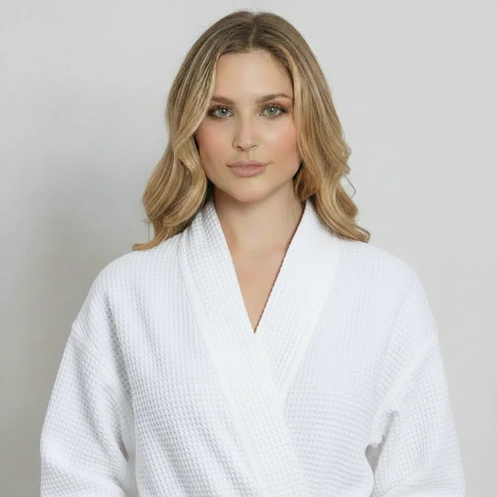 Women’s waffle robe close-up, white V-neck with long sleeves and belt tie