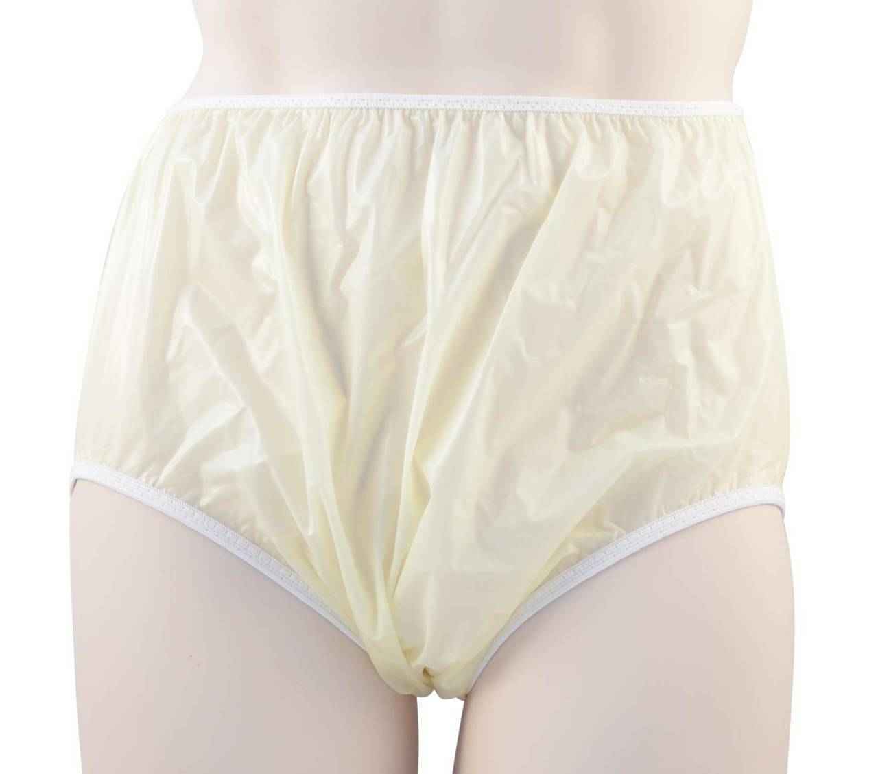 Light cream pull-on plastic pants with elastic waistband and leg cuffs
