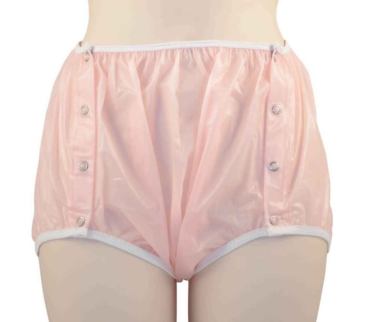 Translucent plastic snap-on pants, soft pink, snap buttons along the sides
