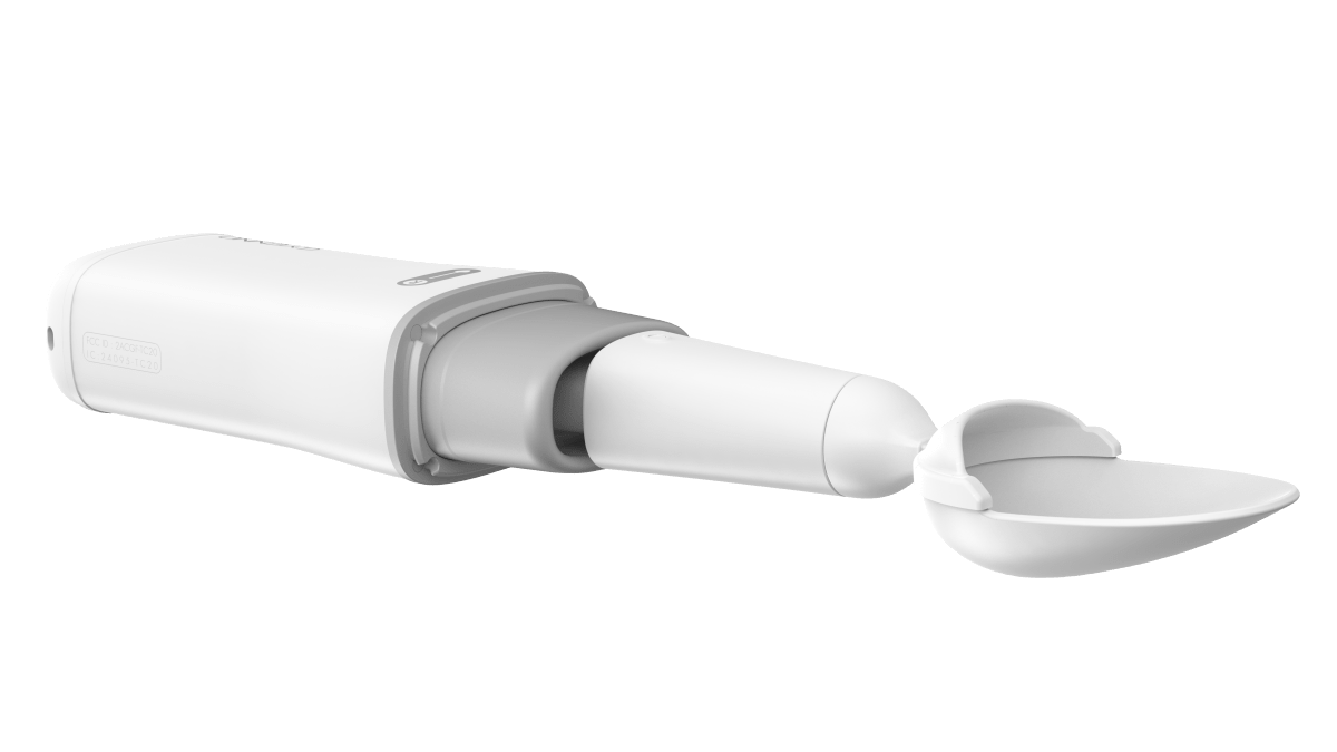 Adaptive twist spoon with white handle, grey joint, and wide rounded spoon bowl