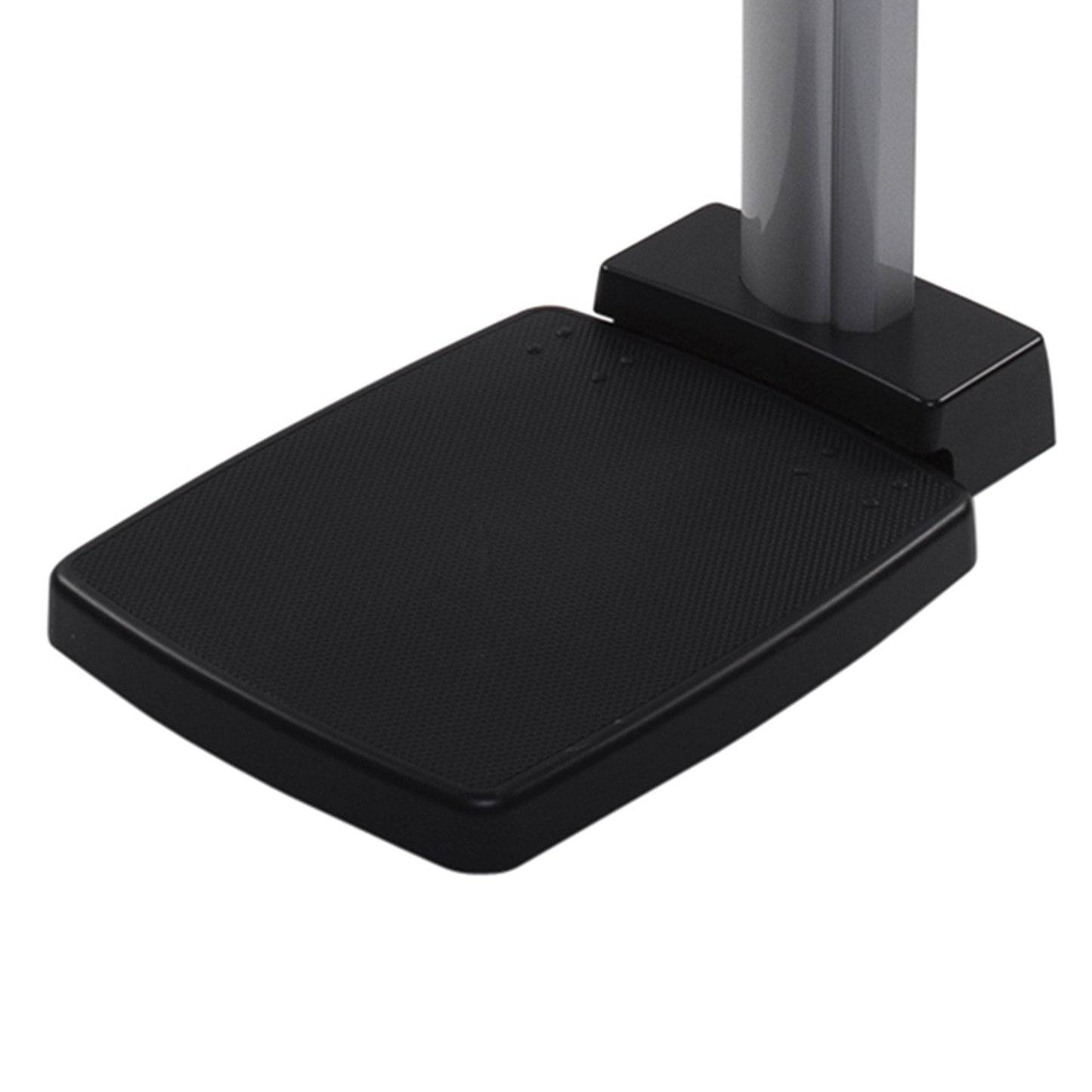 Non-slip black weighing platform with raised edges for physician scale