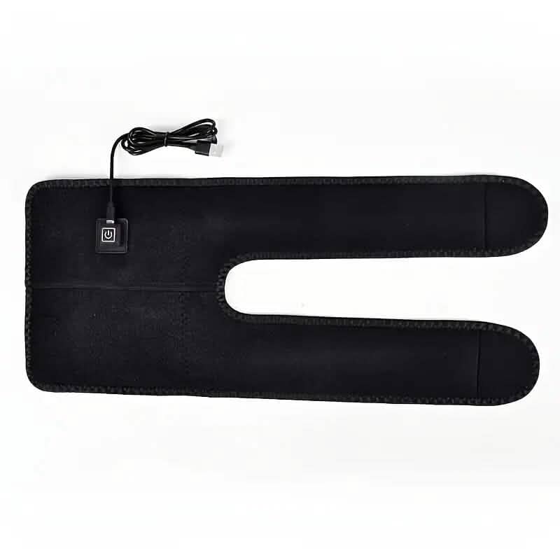 Black heated knee pads laid flat with controller and USB power cord