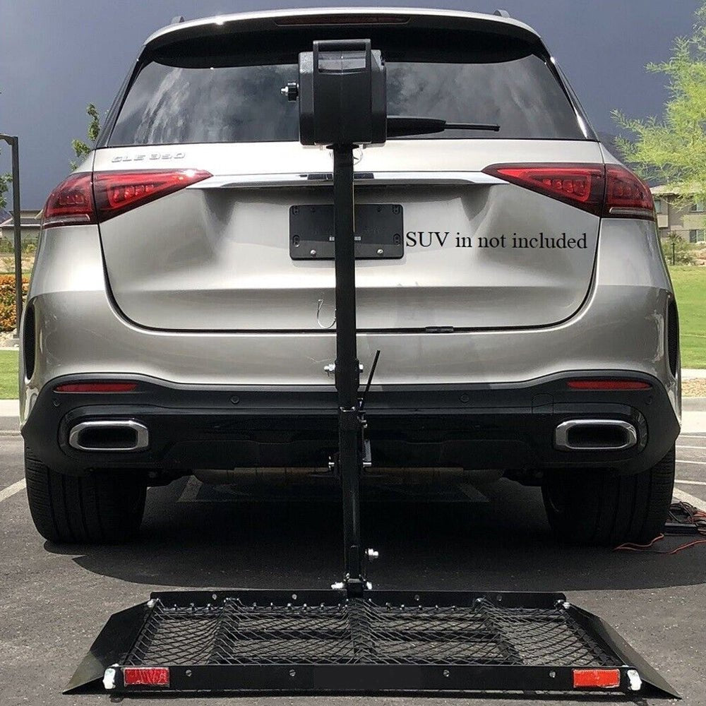 Rear-mounted wheelchair lift platform with metal mesh gate on vehicle rear