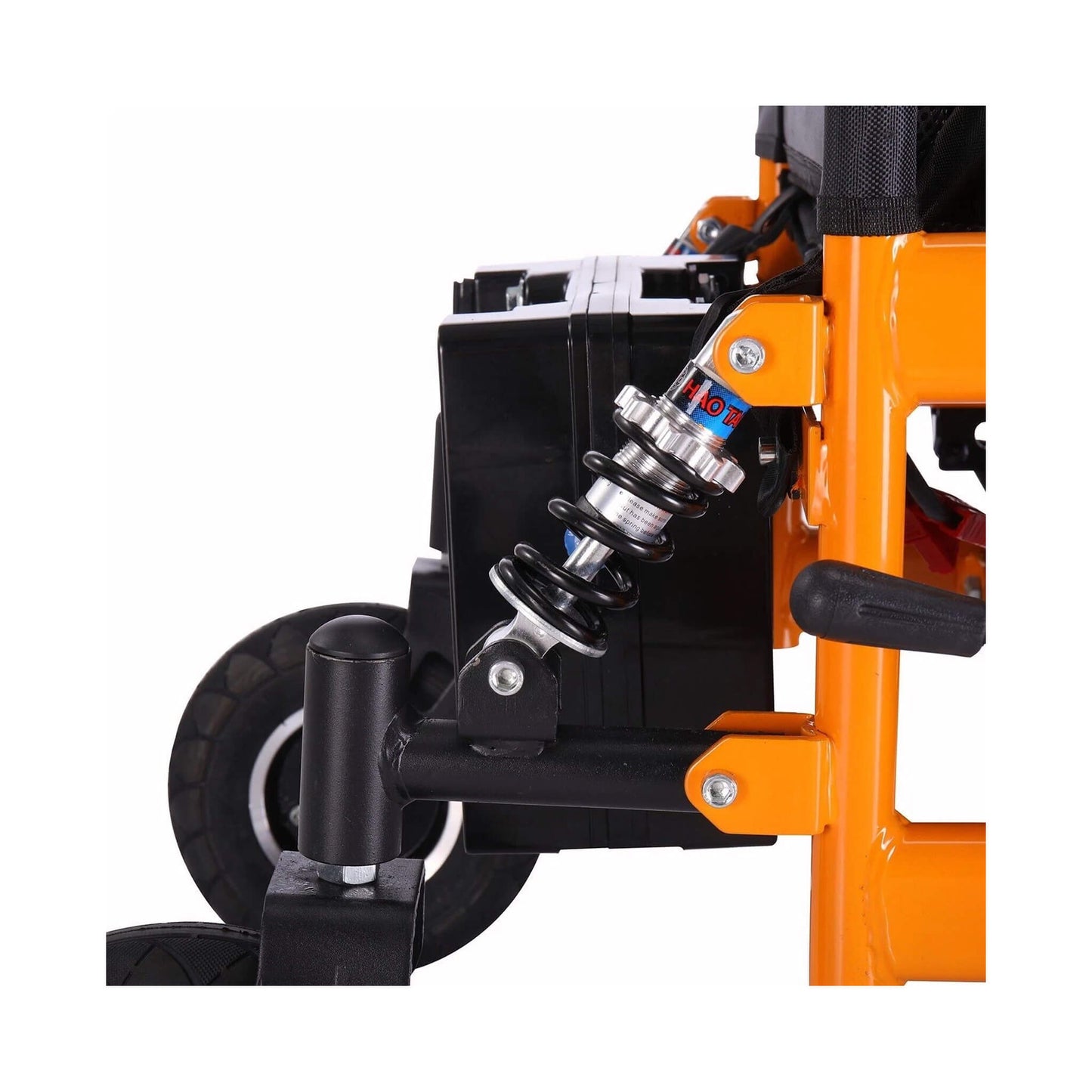 Motivo Heavy-Duty Ultralight Wheelchair: Close-up of orange frame with shock absorber and rear wheel