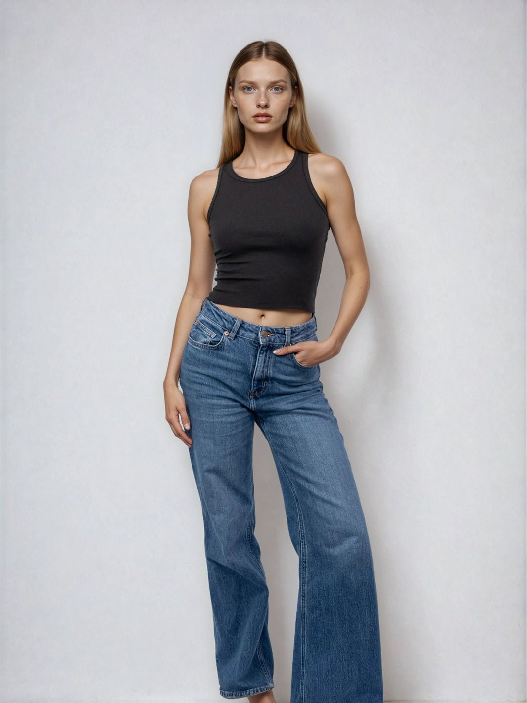 Cropped high-neck tank with raw hem, dark sleeveless top