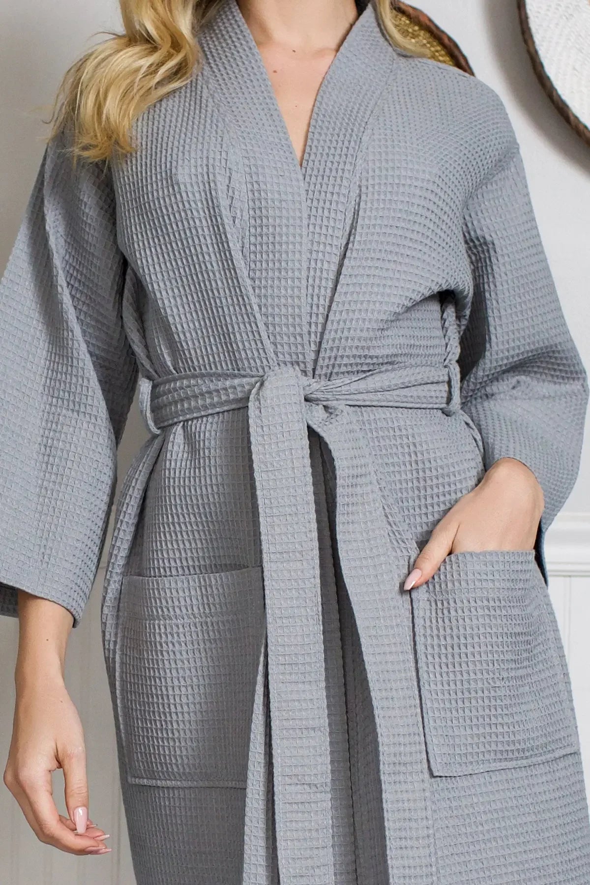 Grey waffle robe detail, belted V-neck wrap with textured fabric