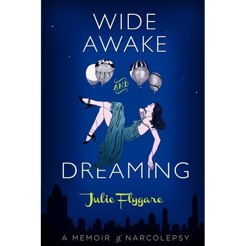 Paperback memoir book with blue cover, “Wide Awake and Dreaming” title and Julie Flygare
