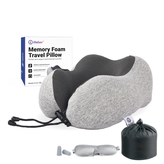 Gray U-shaped memory foam travel pillow with dark inner panel, strap and carry pouch