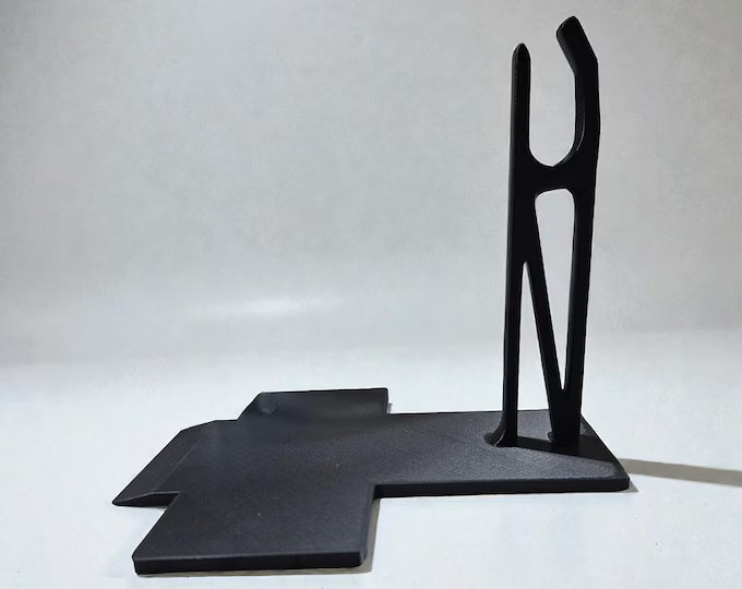 Black wheelchair grocery bag hook with U-shaped holder and flat base