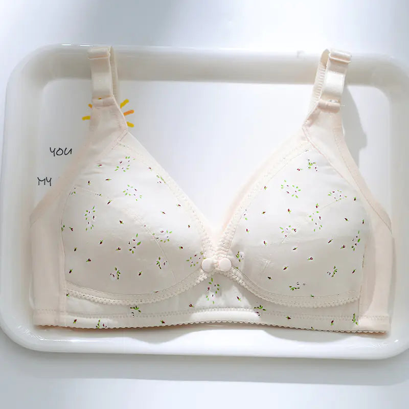 Maternity nursing bra, white with small multicolor speckles, openable snap front, adjustable straps