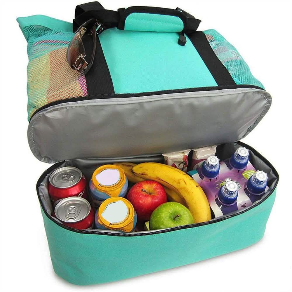 Teal insulated cooler beach bag open, showing food and drinks inside with black straps
