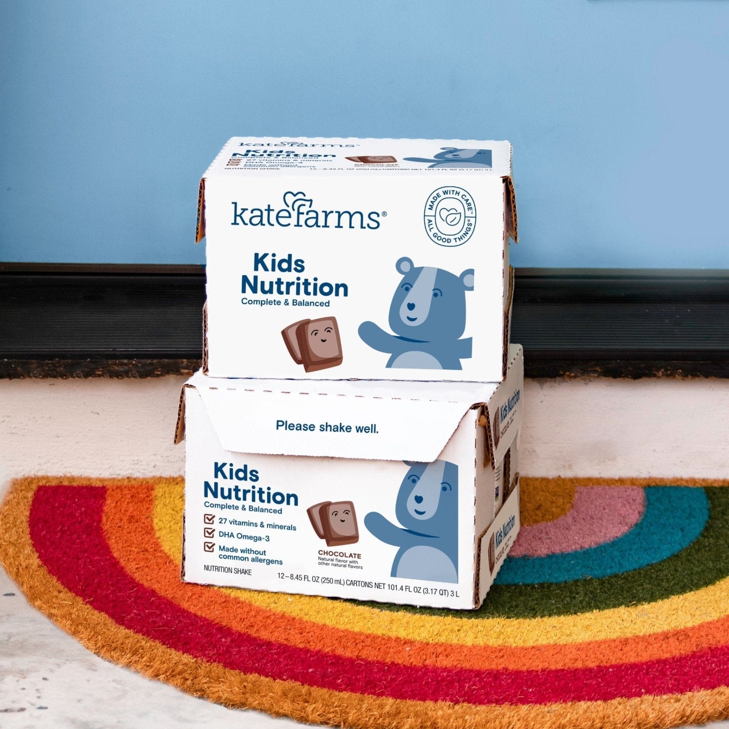 Kids Nutrition shake cartons in a white case box, chocolate flavor