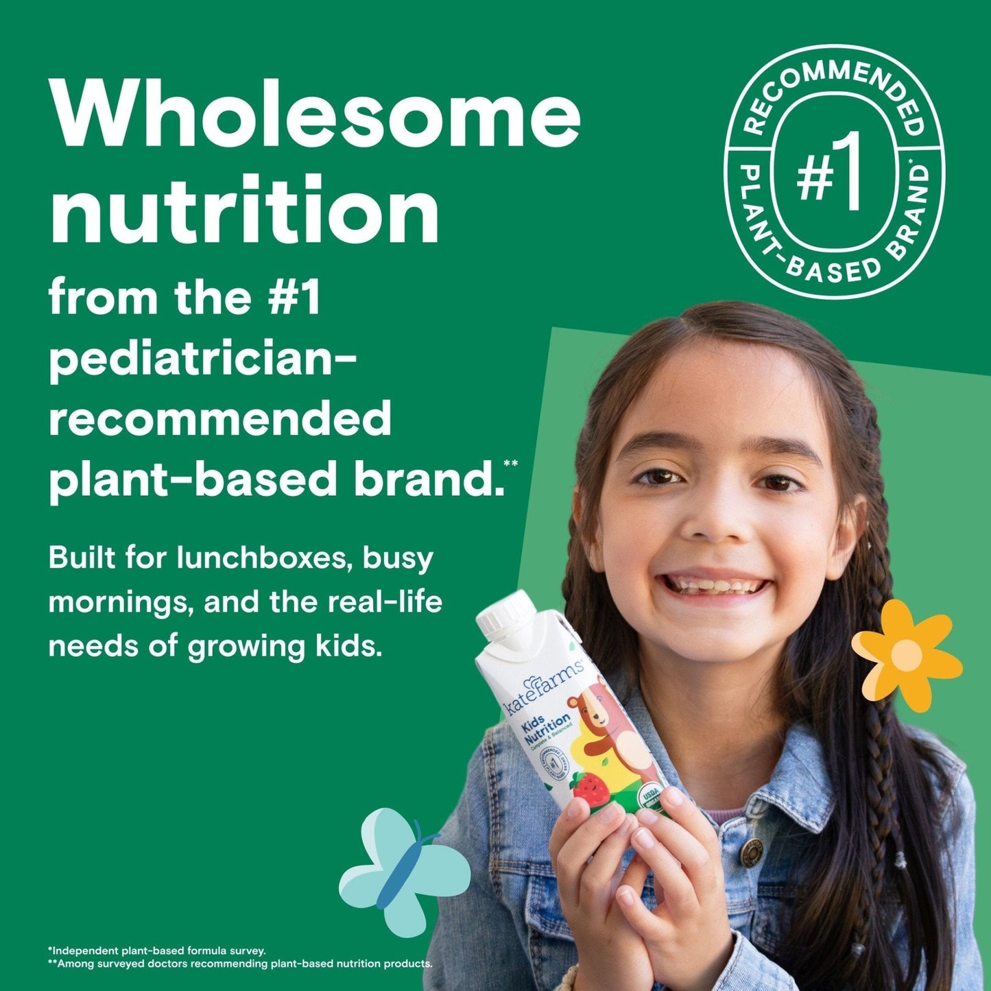 Smiling child holding a Kids Nutrition Shake Strawberry carton