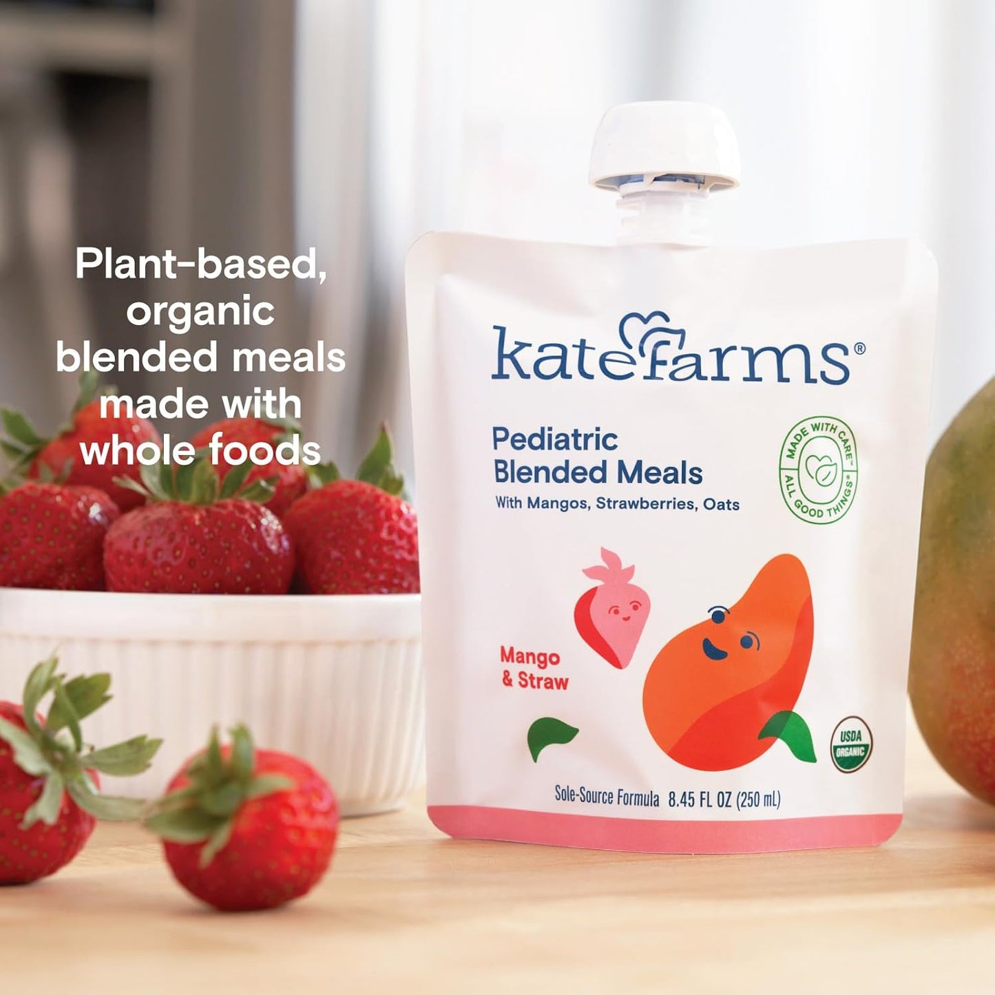 Pediatric blended meals pouch labeled plant-based, organic, Mango & Strawberry