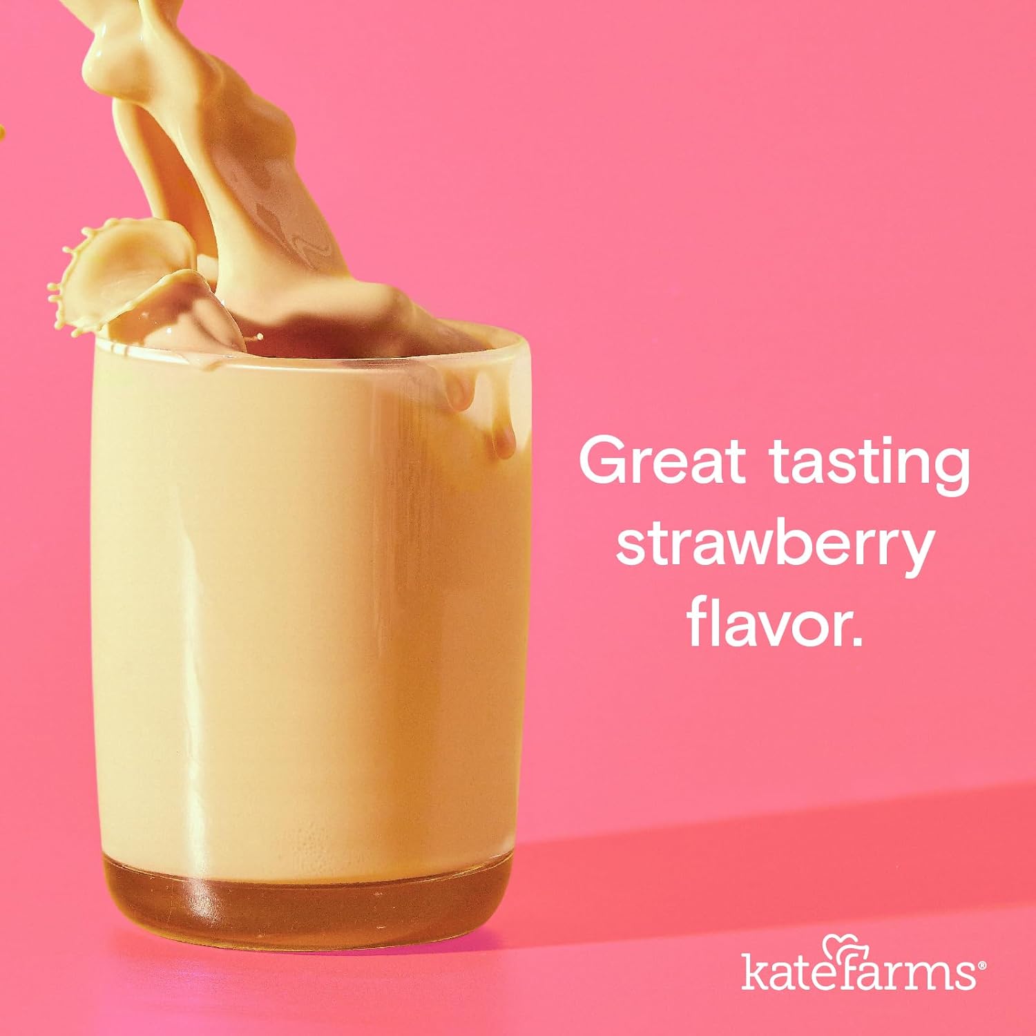Strawberry flavor pediatric peptide formula pour into a glass cup.