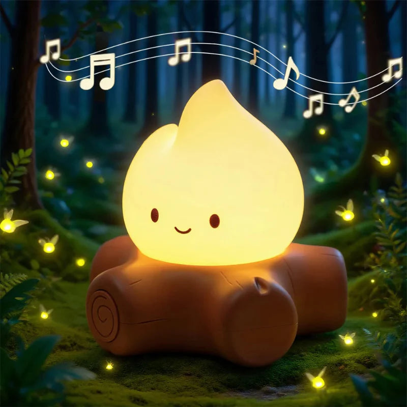 Glowing campfire night light with smiling teardrop flame on brown log base