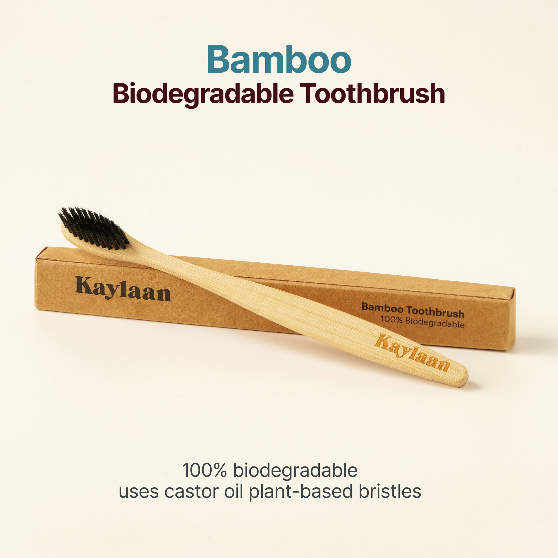Bamboo biodegradable toothbrush with black bristles in cardboard sleeve