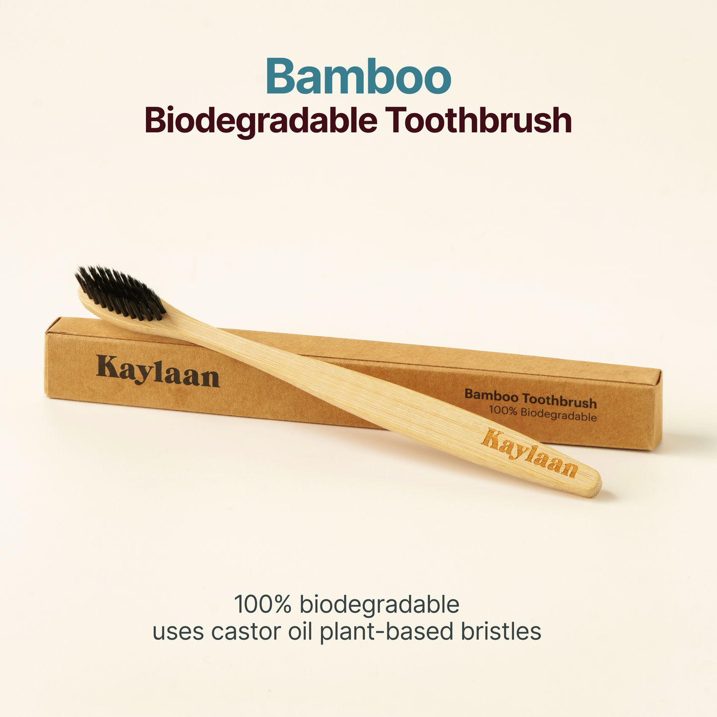 Bamboo biodegradable toothbrush with black bristles in brown cardboard box