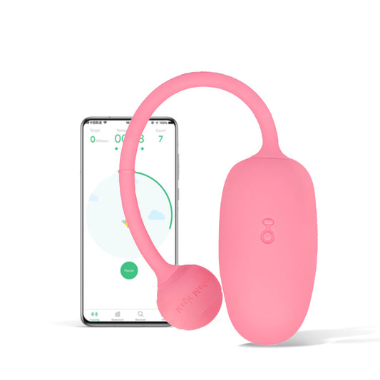 Kegel Coach pink silicone pelvic floor trainer with loop handle and control pod