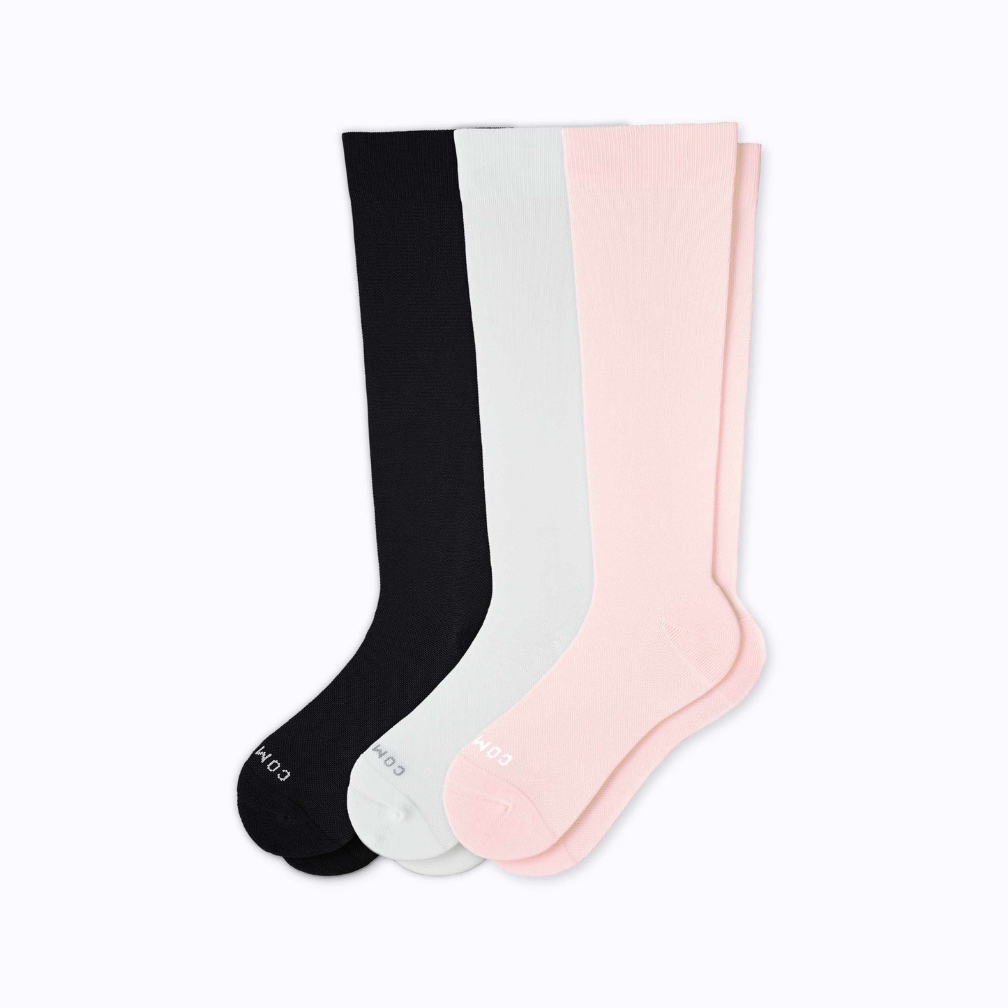 Knee-high compression socks 3-pack: black, light gray, and rose pairs stacked