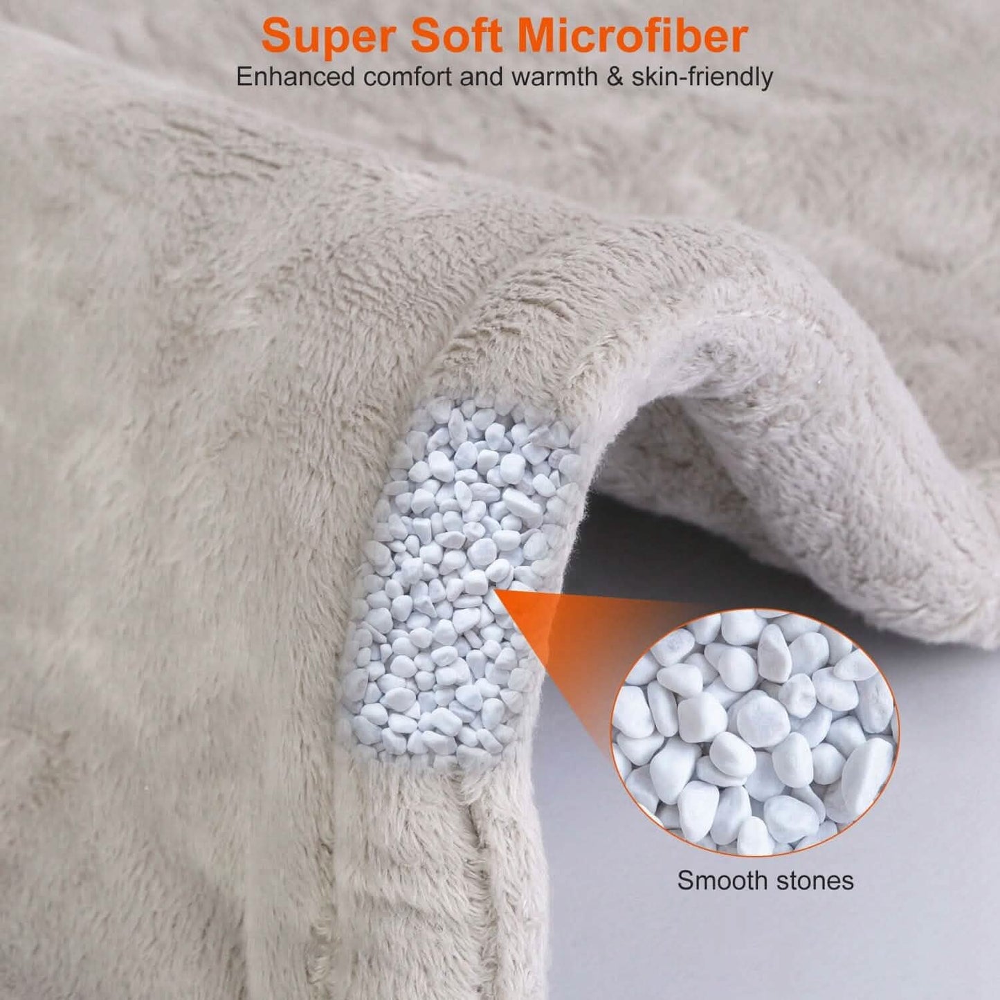 Grey microfiber heating pad with smooth stones filling, plush fabric close-up