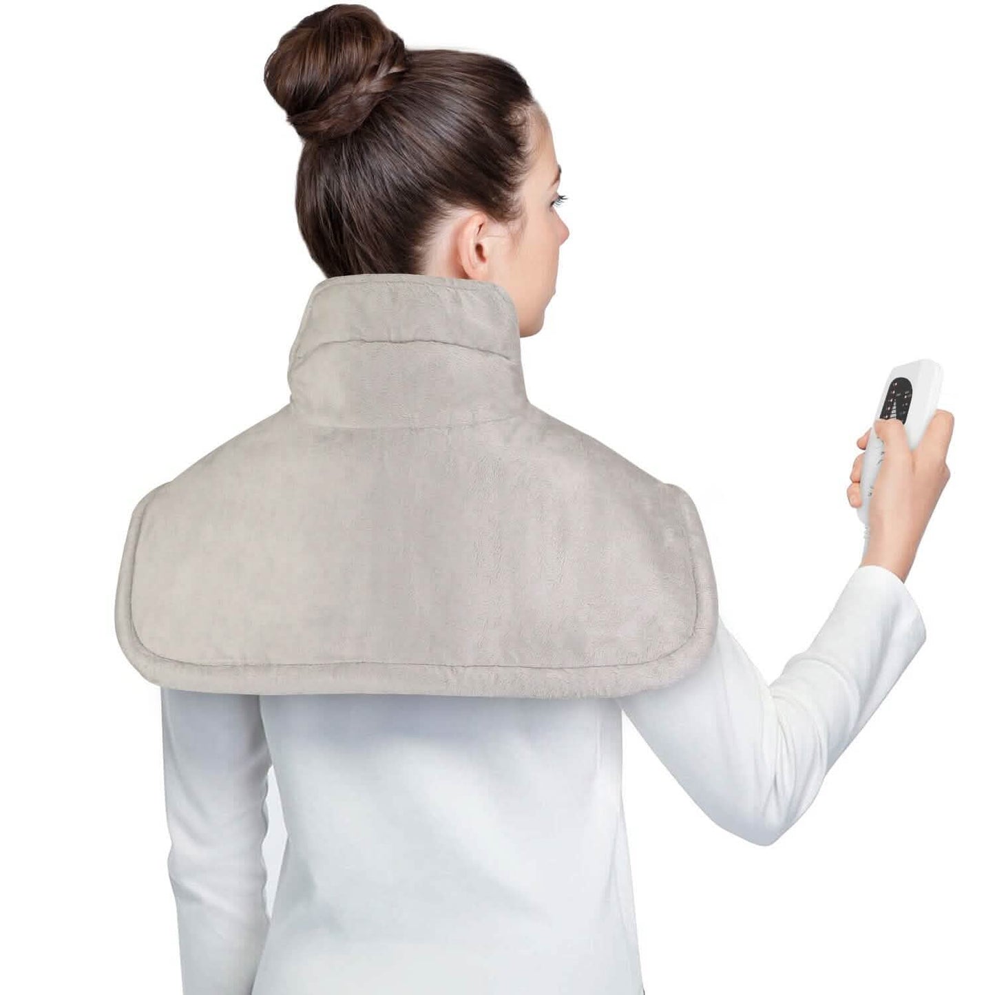 Neck and shoulder heating pad, plush gray cover, worn over shoulders with controller in hand