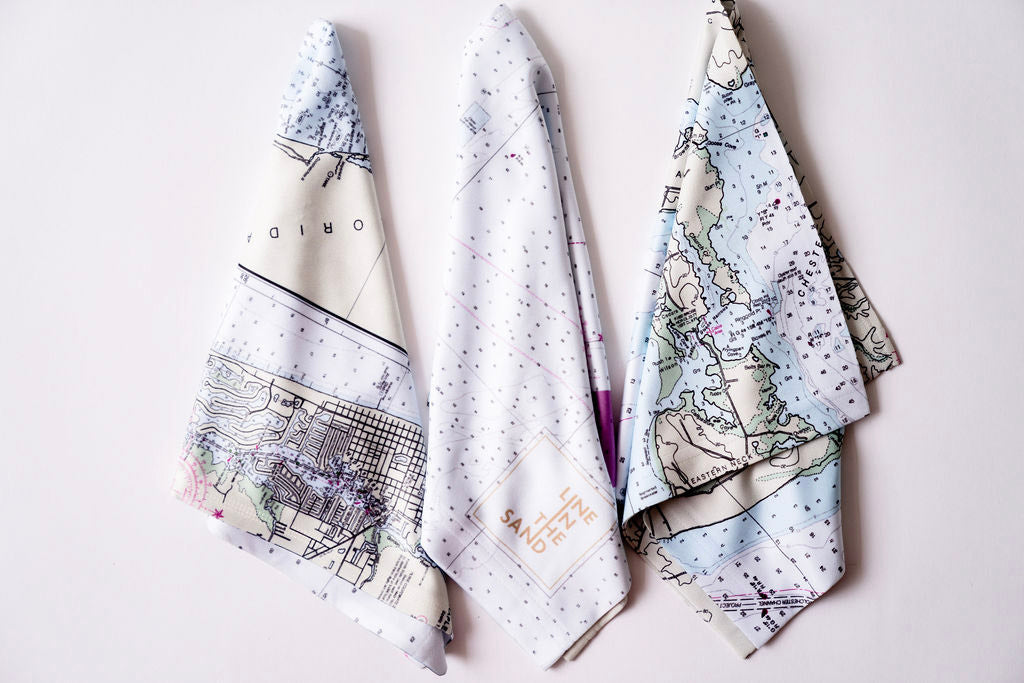 Set of folded solar gaiters with white nautical chart prints