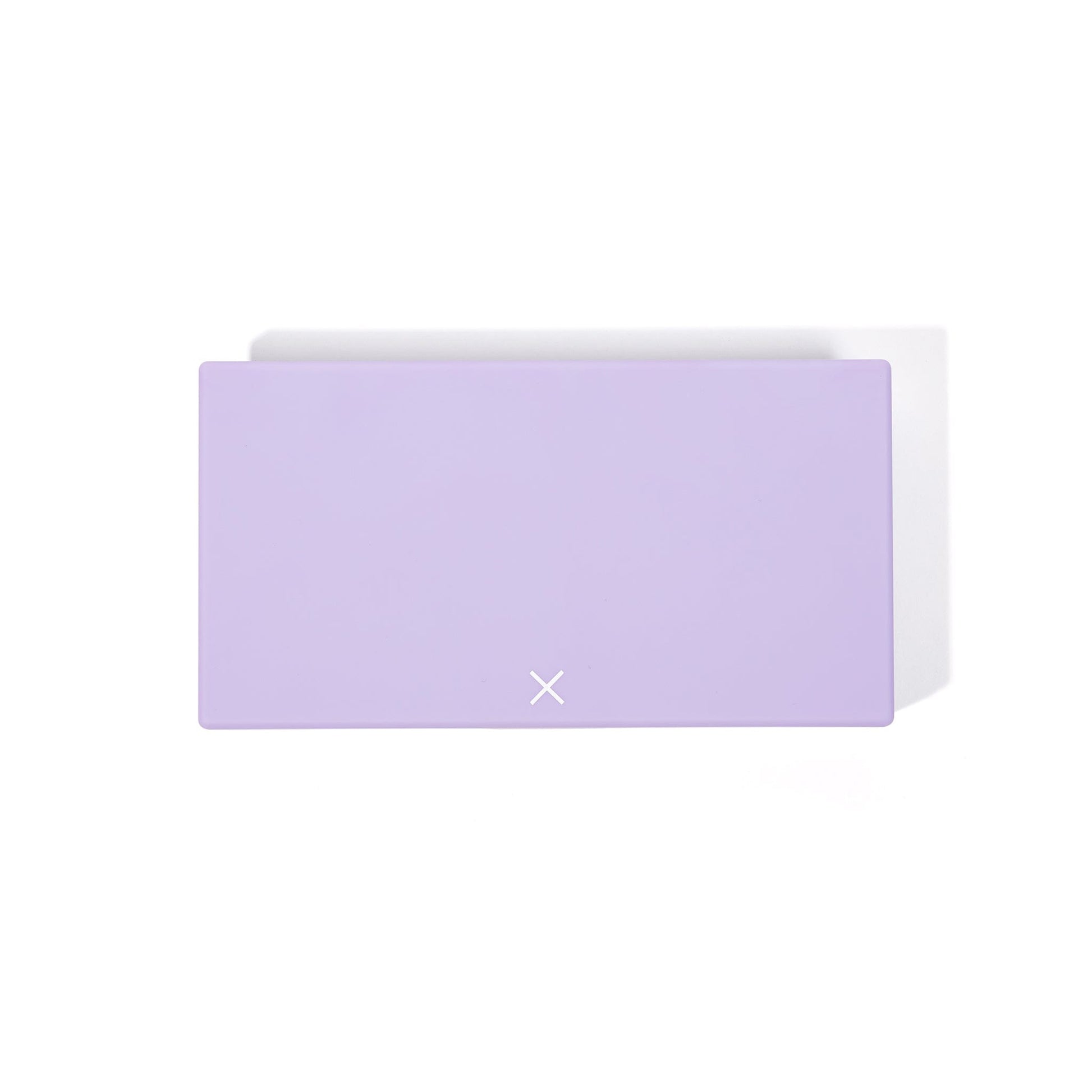 Lilac AM/PM pill box with front latch and X emblem, closed