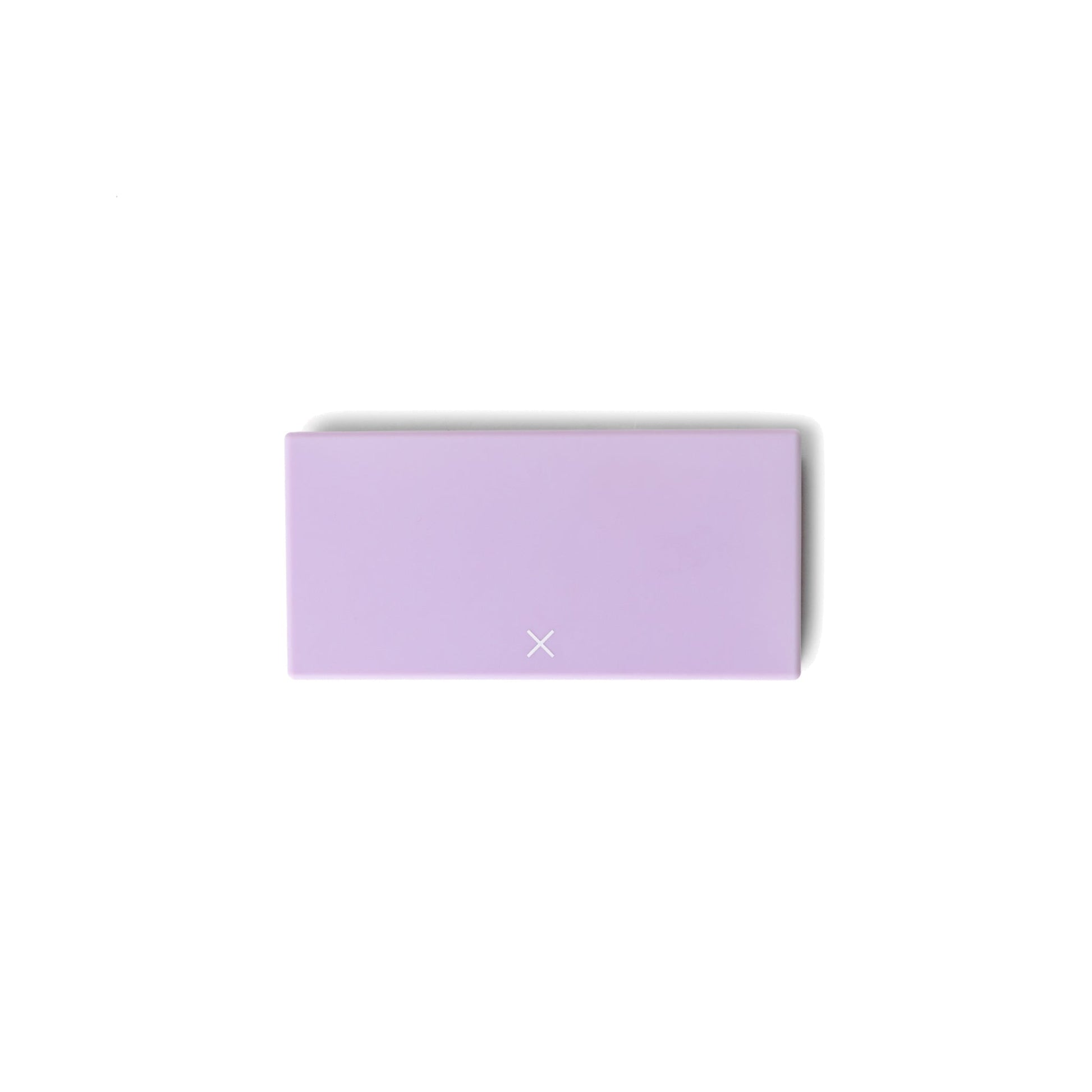 Lilac pill box, closed rectangular case with small X logo